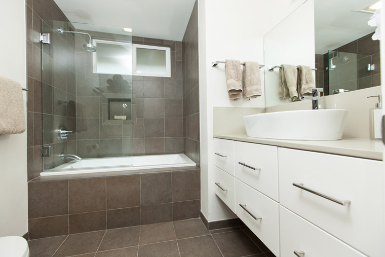 floating-vanity-wall-mounted-white-vessel-sink-modern-bathroom-design